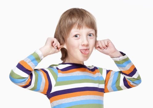 Boy Pulling his Ears and Sticking out Tongue - Isolated on White