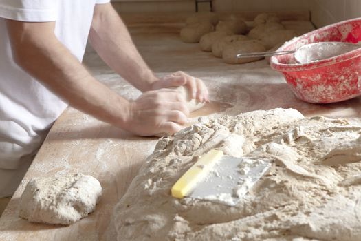 Professional Bakery - Baker Working with Dough.