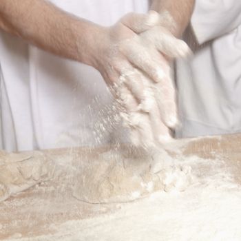 Professional Bakery - Baker Working with Dough.
