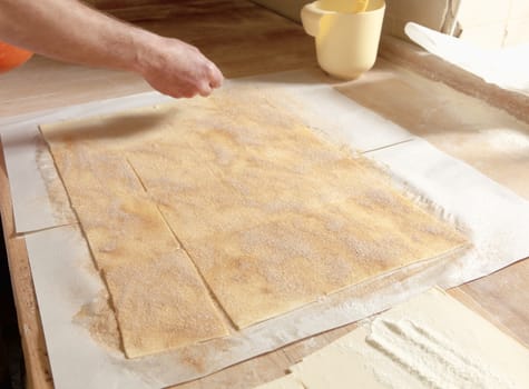 Professional Bakery - Adding Sugar on Top of Pastry