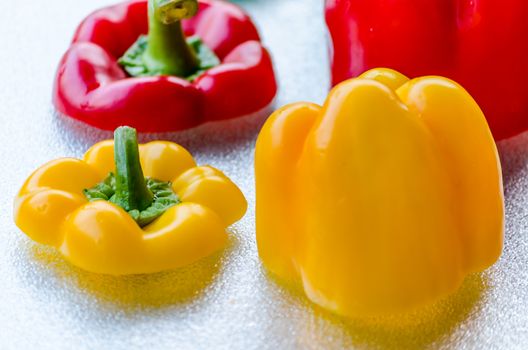 Close-up  Red, Green, Yellow Bell Pepper washed on silver plate.