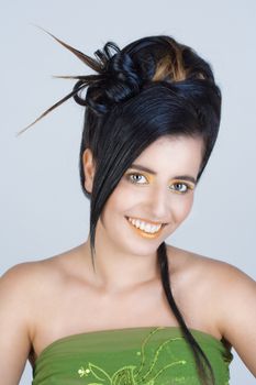 Portrait of a Young Woman with Colorful Makeup and Fancy Hairstyle