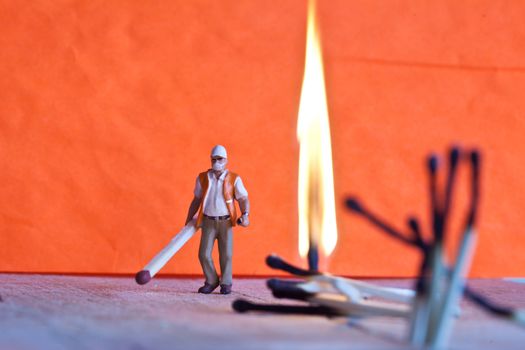 Miniature people in action in various situations