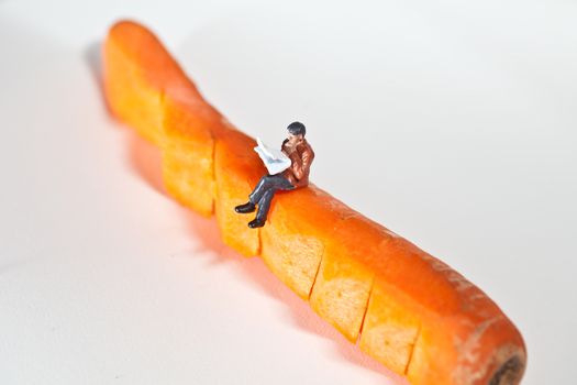 Miniature people in action in various situations