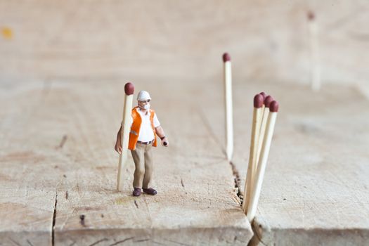 Miniature people in action in various situations