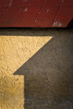 background or texture shadow of the roof at the old house wall