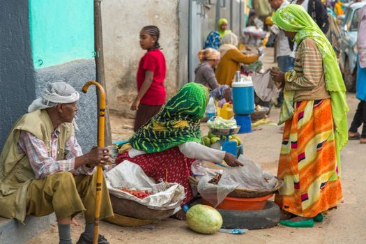 HARAR, ETHIOPIA - JULY 26,2014 - Local residents of Jugol, the fortified historic walled city within Harar, which was included in the World Heritage List for its cultural heritage by UNESCO and considered as the fourth holy city of Islam.