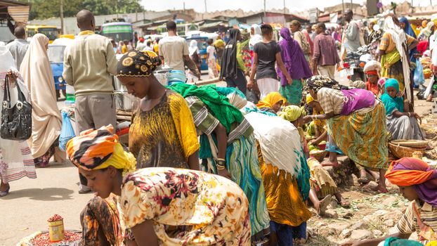 HARAR, ETHIOPIA - JULY 26,2014 - Local residents of Jugol, the fortified historic walled city within Harar, which was included in the World Heritage List for its cultural heritage by UNESCO and considered as the fourth holy city of Islam.