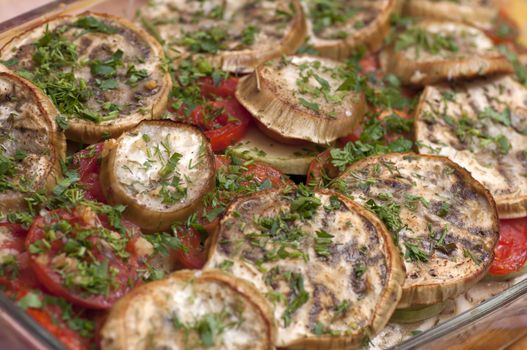 Prepared ratatouille made of white eggplants close up