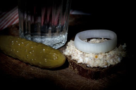 Forshmak (minced herring) on rye bread, light brush