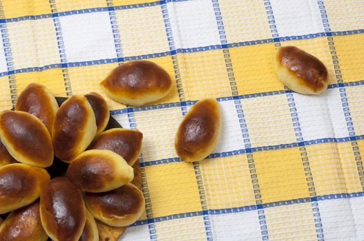 Homemade pastries (patties) on towel