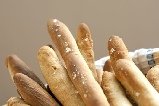 Salted crisp Italian breadsticks in basket