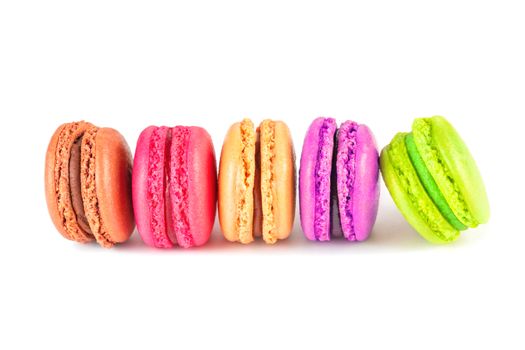 colorful macarons on white background