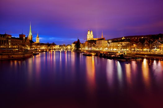 view on Fraumunster Church, Church of St. Peter and Grossmunster at night, Zurich, Switzerland