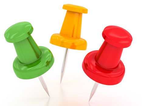 colored pushpins on a white background