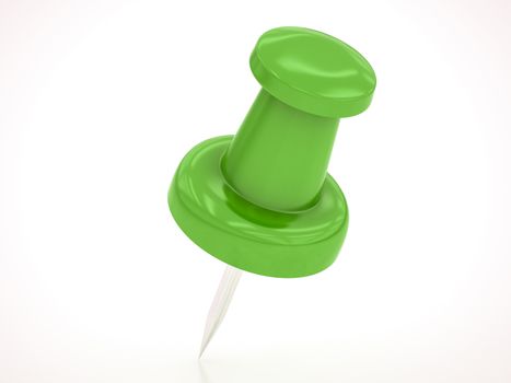 green pushpin on a white background