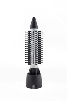 Comb brush accessories for hair dryer isolated on white .