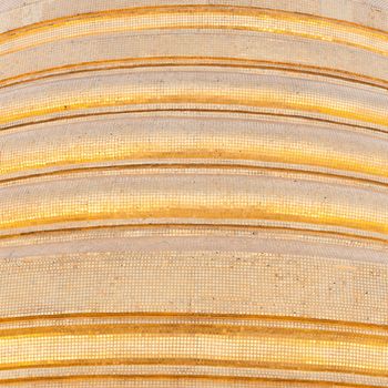 Background golden pagoda. Cement sheets baked golden.