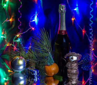 Christmas still life with champagne and Christmas decorations