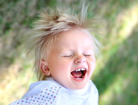 Happy Child in the Summer Park