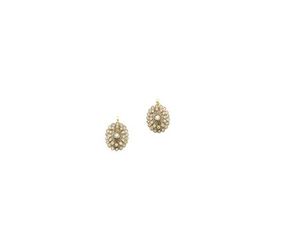 A couple of diamond earringsa