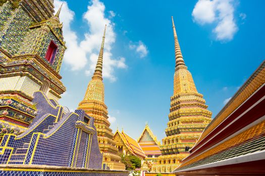 Pagodas of Wat Pho, the Temple of the Reclining Buddha or Wat Phra Chetuphon. Bangkok, Thailand.