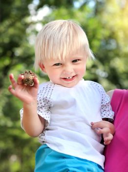 Cheerful Child in the Summer Park