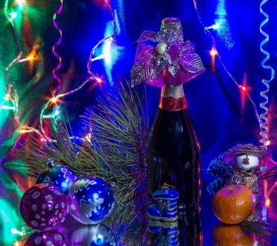 Christmas still life with champagne and Christmas decorations