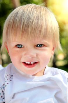 Cheerful Child Portrait at the Summer Park