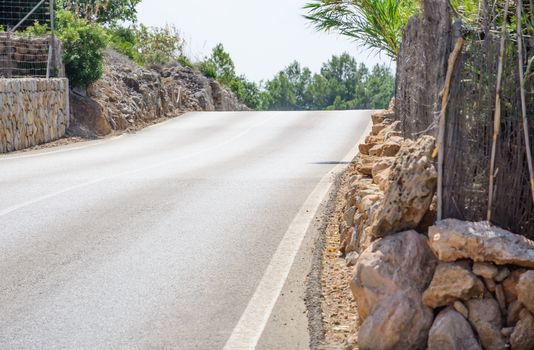 Road crest in Mallorca, Balearic islands, Spain in July.