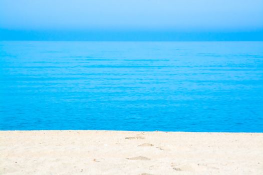 Sand tracks and footprints into the water. Mallorca, Balearic islands, Spain.