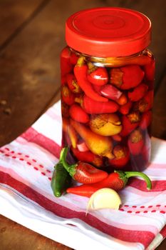 red chilli peppers in jar, shalow dof