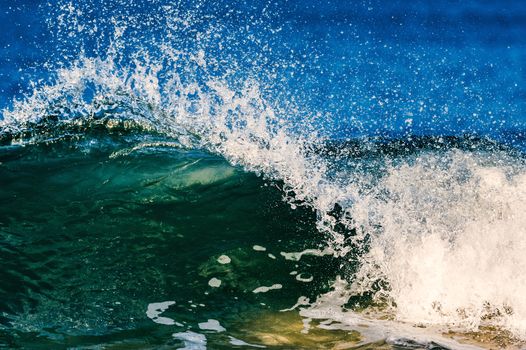 Sea waves break on the shore