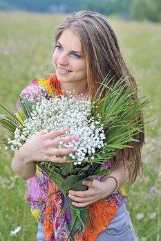 young beautiful girl in the field

