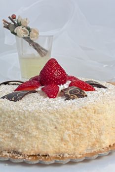 inviting cake with sponge cake and red strawberries