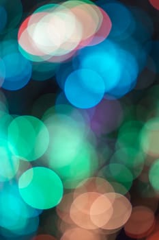 Colored defocused lights background. Abstract bokeh lights .