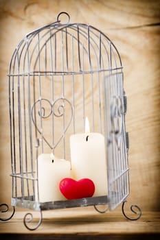 Candlestick cage style, candles, Valentine's Day decor.