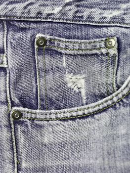 Extreme close up on blue jeans texture
