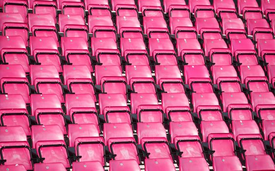 Pink Spectators seats at a stadium