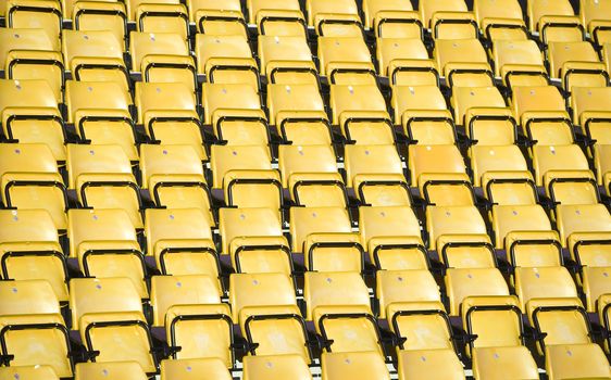 Yellow Spectators seats at a stadium
