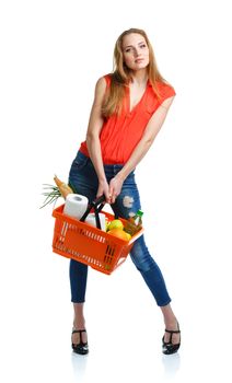 Young caucasian woman with assorted grocery products in shopping basket isolated on white background