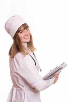 Portrait of medical worker in a white coat, hat, with documents