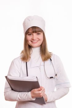 Portrait of medical worker in a white coat, hat, with documents