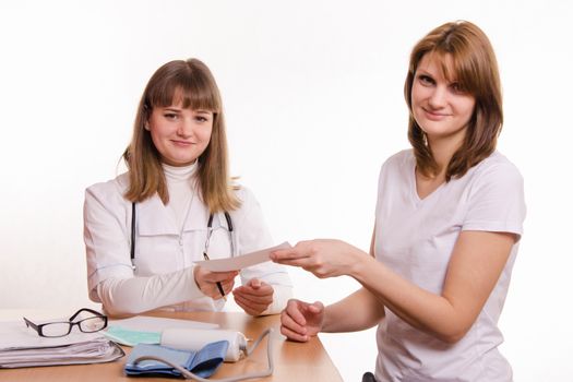 The girl on reception at the doctor-therapist