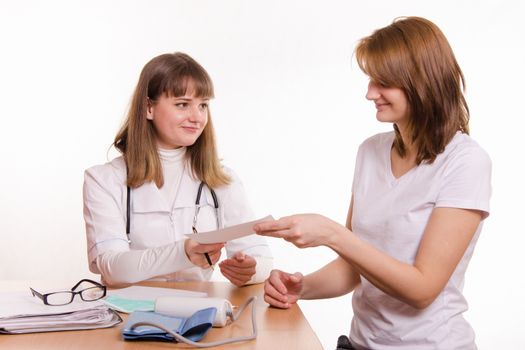 The girl on reception at the doctor-therapist