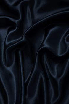 Smooth elegant black silk can use as background 