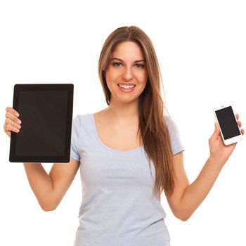 Young caucasian woman with tablet PC and smartphone over white background