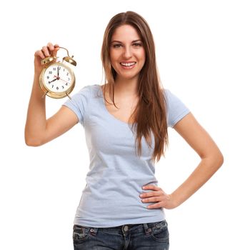 Young caucasian woman with alarm clock in her hands