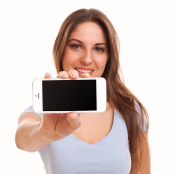 Young caucasian woman with smartphone isolated over white background