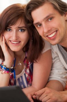 Young beautiful caucasian couple at home